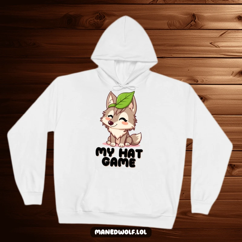 Funny maned wolf hoodie featuring a wolf giggling while attempting to wear a leaf as a hat, combining warmth and comic delight.