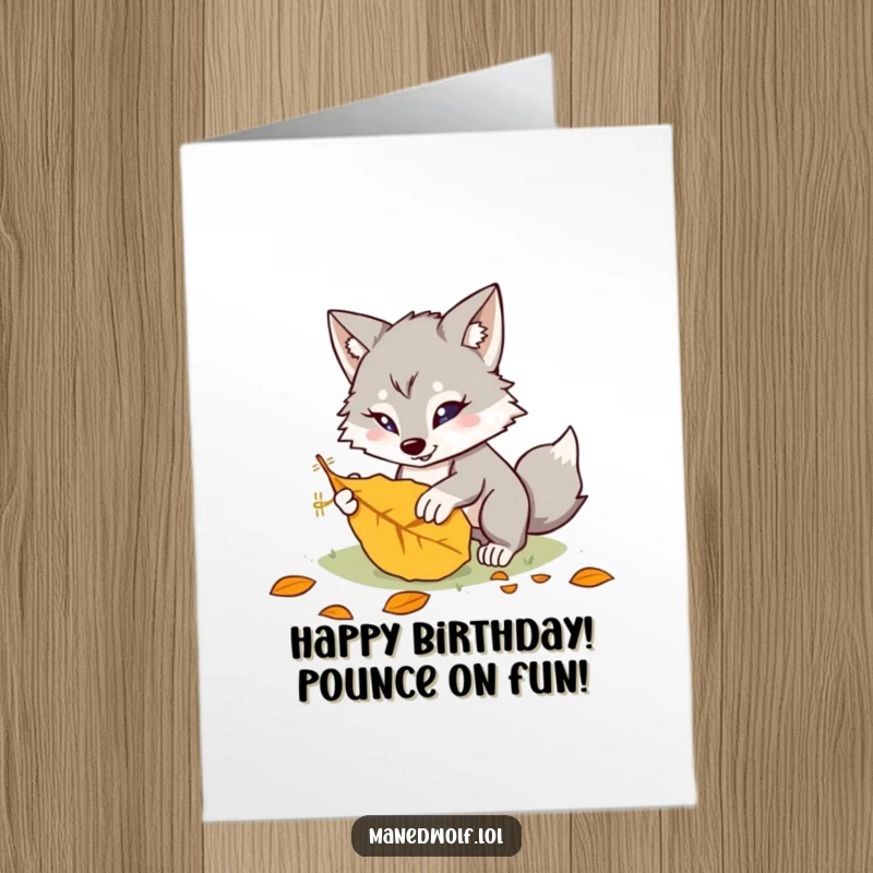Funny Free Printable Birthday Card: A kawaii maned wolf playfully pounces on a fallen leaf, celebrating your birthday with wild joy.